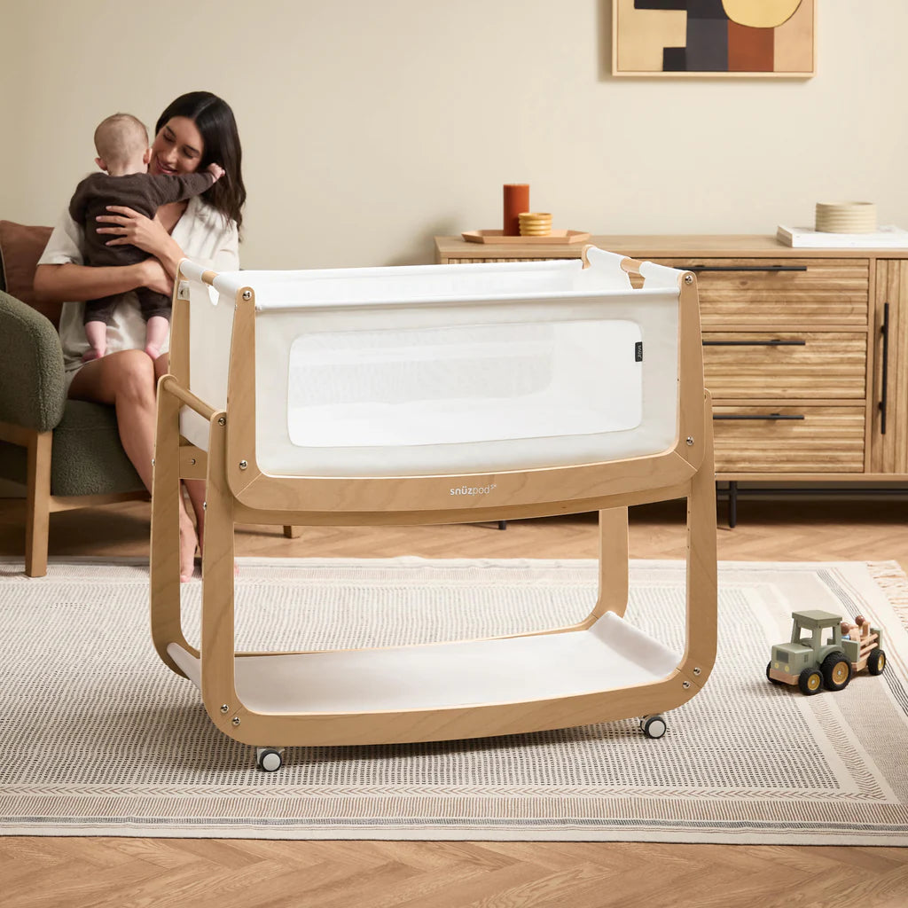SnuzPod 5 Bedside Crib - Natural - Lifetyle - The Baby Service - Wheels