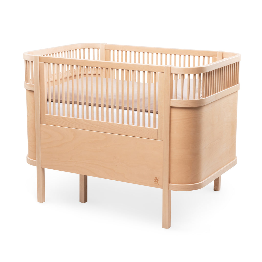 Sebra Cot Bed Baby & Junior - Wooden Edition - The Baby Service - Side View