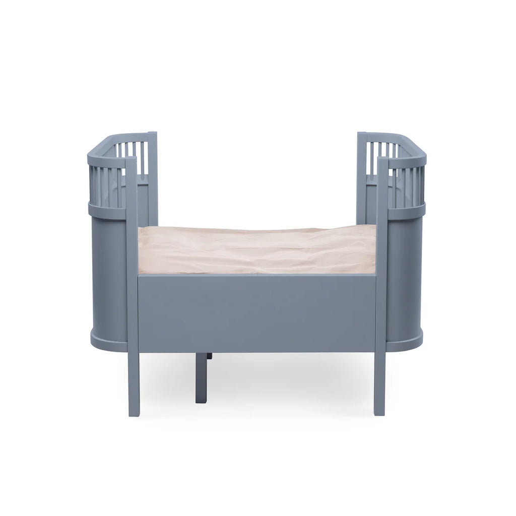 Sebra Cot Bed in Forest Lake Blue set up for toddler with low mattress base